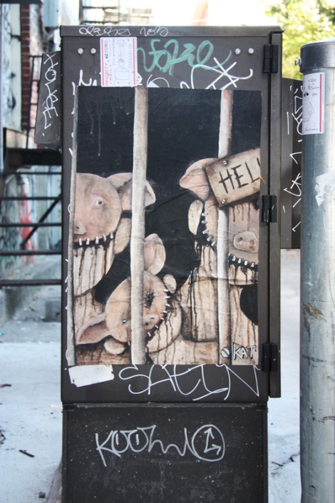 Kat poster in alley between St-Laurent and Clark