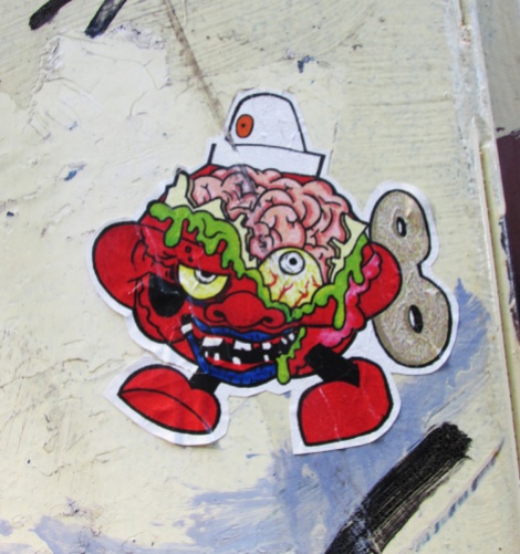 paste-up by Turtle Caps in alley between St-Laurent and Clark