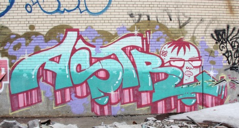 Astro graffiti on abandoned warehouse in Hochelaga