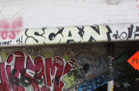 Scaner graffiti (top) beneath bridge