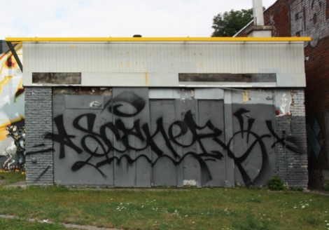 Tall tag by Scaner