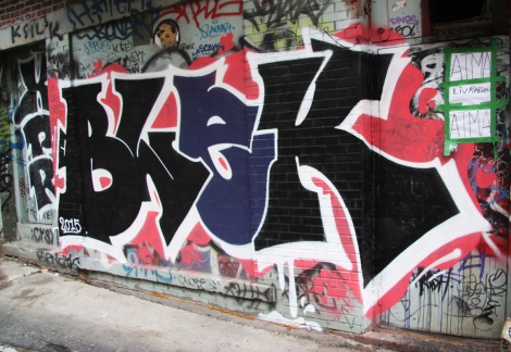 Blek graffiti in alley between St-Laurent and Clark