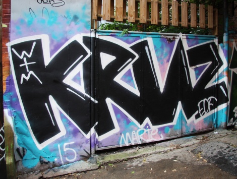 Kruz graffiti in alley between St-Laurent and Clark