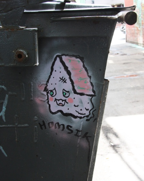 Small piece by Homsik on garbage bin in a Plateau back alley