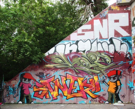 Pieces by Saner (top), Skope (middle), Saner (bottom letters) and Koni (bottom characters) at Rouen tunnel