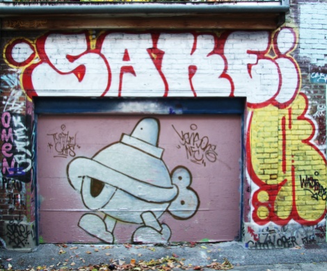 Turtle Caps (on door), Sake throwie at the top, Wastoids on the right, in Plateau End alley