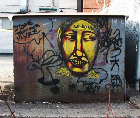 Labrona wheatpaste (right) and Lapin drawing (left), in Hochelaga