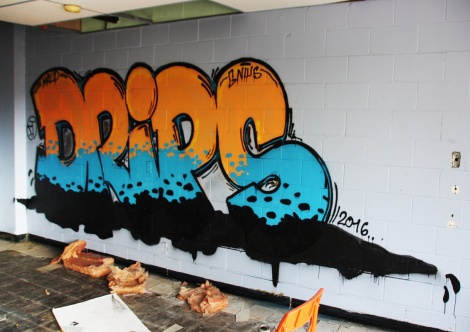 Drips graffiti piece found in an abandoned school