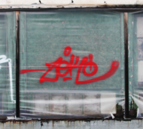 Zek tag on abandoned building