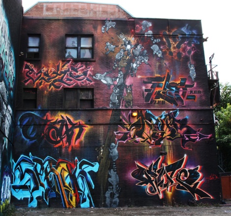Under Pressure 2016 K6A wall featuring Axe (racoons), Serak (bottom left), Otak (middle left), Satyr (top left), Fleo (top right), Dodo Osé (middle right) and Fluke (bottom right)