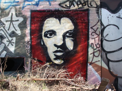 unidentified artist outside the abandoned "Jailspot"