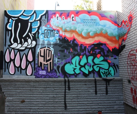 Germdee (left), Awe (bottom right) and Wzrds Gng (top right) in a Mile End alley