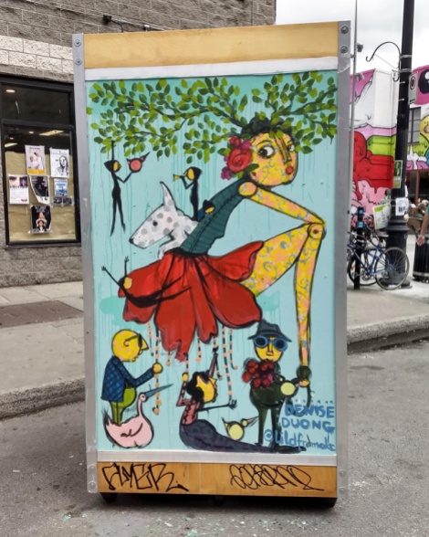 Denise Duong on one of the info boards for the 2019 edition of Mural Festival
